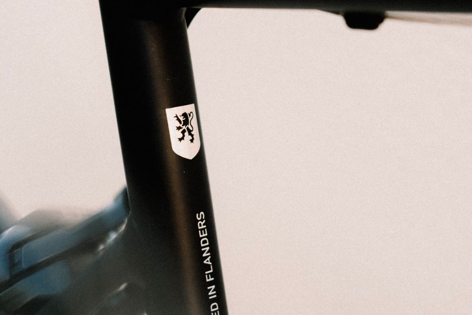 Close-up of a bicycle frame where the top tube meets the seat tube